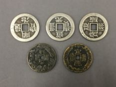 Four Chinese coins