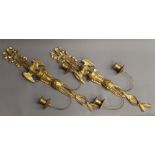 A pair of carved giltwood twin-branch wall lights. 74 cm high.