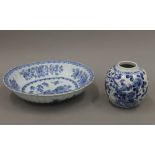 An 18th century Chinese blue and white porcelain bowl and a 19th century blue and white porcelain