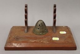 A desk stand, the underside with inscribed paper label 'The Great War 1914-18,