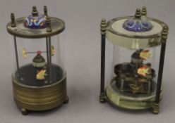 Two cloisonne decorated fish clocks. 15.5 cm high.