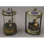 Two cloisonne decorated fish clocks. 15.5 cm high.