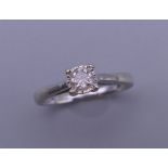 A white gold diamond solitaire ring, the stone approximately 0.25 carats. Ring size K/L. 1.