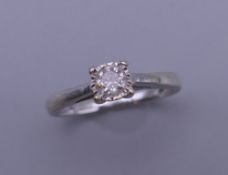 A white gold diamond solitaire ring, the stone approximately 0.25 carats. Ring size K/L. 1.