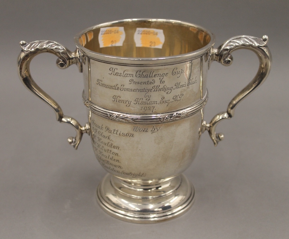 A silver trophy,