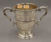 A silver trophy,