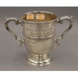 A silver trophy,