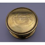 A Wood Abrahams brass lens. 5 cm diameter.