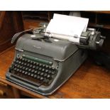 A 1950's Olympia typewriter.