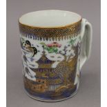 An 18th century Chinese porcelain tankard. 10.5 cm high.