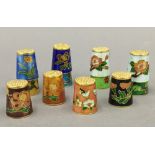 Twelve Chinese cloisonne thimbles.