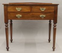 A Victorian mahogany three drawer side table. 92 cm wide.