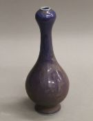 A small Chinese purple garlic neck vase. 17 cm high.