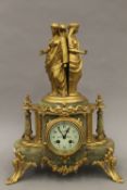 A Victorian gilt metal mounted onyx mantle clock. 50 cm high.