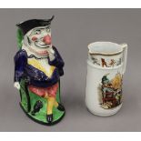 A Mr Punch toby jug and a Victorian jug decorated with Mr Punch and Toby. The former 26.5 cm high.