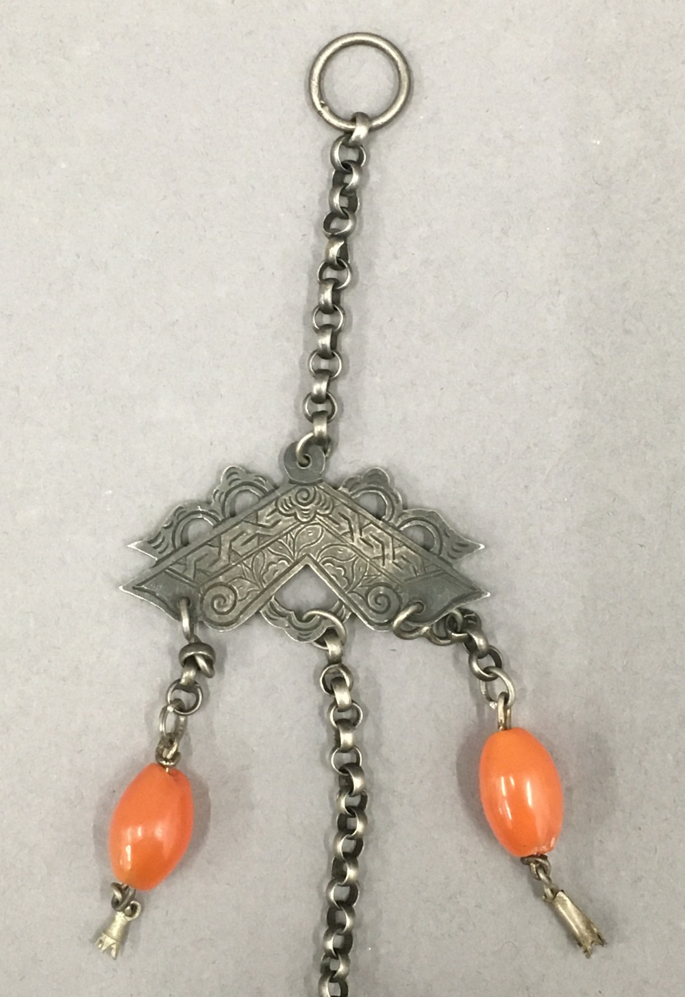 A Chinese unmarked white metal chatelaine. 25 cm high. - Image 3 of 3