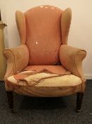 A Victorian wing back armchair. 80 cm wide.