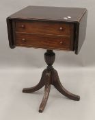 A 19th century mahogany Pembroke work table. 50.5 cm wide flaps down.