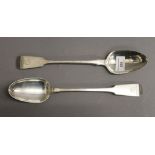 Two Georgian silver basting spoons. Each 30.5 cm long. 9.2 troy ounces.