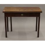 A George III mahogany tea table. 91 cm wide.