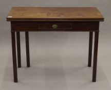 A George III mahogany tea table. 91 cm wide.