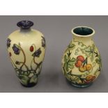 Two small yellow ground modern Moorcroft vases, one Bryony pattern. The largest 15.5 cm high.