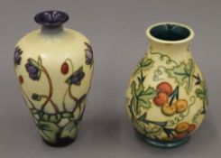 Two small yellow ground modern Moorcroft vases, one Bryony pattern. The largest 15.5 cm high.