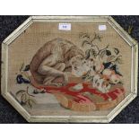 An early 19th century embroidered tapestry of a monkey, playing kittens and fruit,