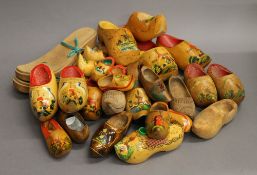 A quantity of various clogs