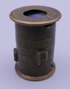 A Watkins Junior Exposure Meter. 4 cm high.