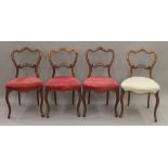 A set of four Victorian rosewood dining chairs