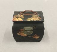 A small Japanese lacquered box. 6.5 cm wide.