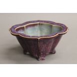A Chinese purple ground porcelain censer. 16.5 cm wide.