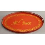 A large chinoiserie decorated tray. 76 cm wide.