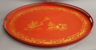 A large chinoiserie decorated tray. 76 cm wide.