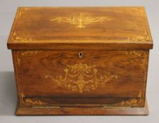 A Victorian inlaid rosewood stationery box. 30.5 cm wide.