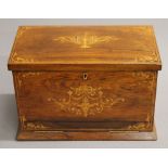 A Victorian inlaid rosewood stationery box. 30.5 cm wide.