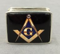 A silver Masonic pill box. 3 cm wide.