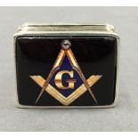 A silver Masonic pill box. 3 cm wide.