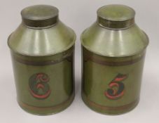 A pair of Victorian toleware tea tins. Each 35 cm high.