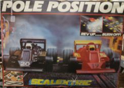 A boxed Scalextric and various accessories