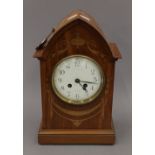 An Edwardian inlaid mantle clock. 33 cm high.