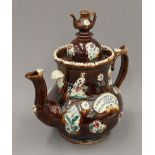 A large Edwardian pottery Barge tea pot. 32.5 cm high.