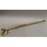 A vintage spilt cane fishing rod by B Little & Co.
