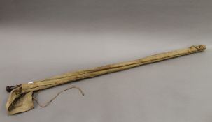 A vintage spilt cane fishing rod by B Little & Co.