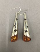 A pair of dress earrings. 5 cm high.