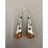 A pair of dress earrings. 5 cm high.