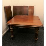 A Victorian mahogany four leaf extending dining table. 125.5 cm wide x 191 cm long.