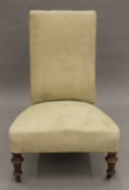 A Victorian nursing chair. 70 cm high.