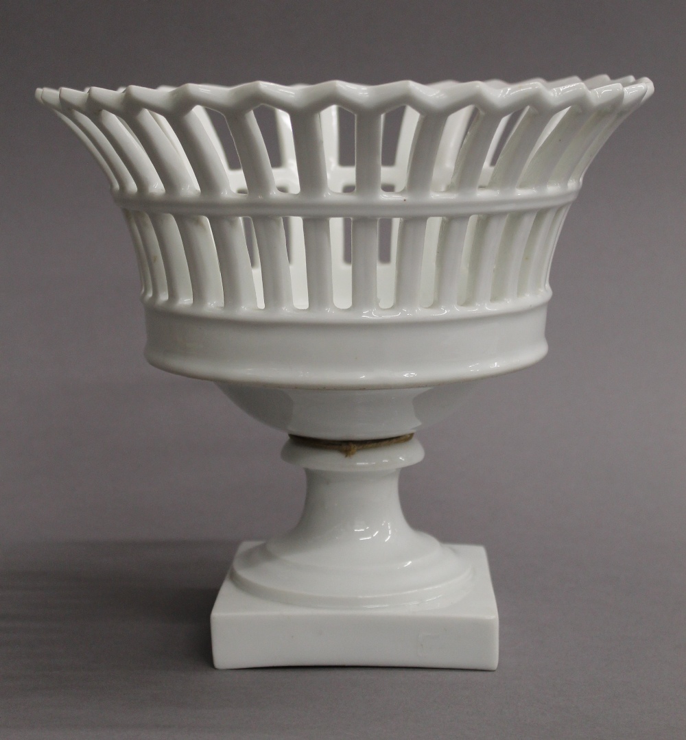 A white porcelain pierced fruit basket. 21 cm high. - Image 2 of 4